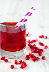 pomegranate juice on table