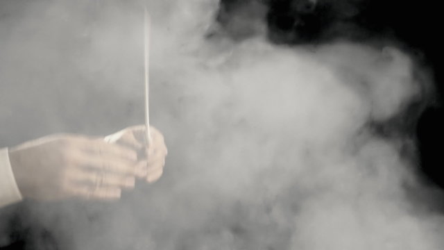 Orchestra leader smoke side hands