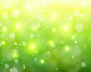 Fototapeta na wymiar Green sunny background, glittering defocused bokeh,