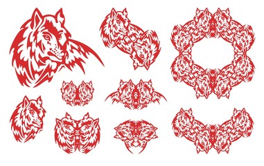 Red wolf symbols. Set of the flaming symbols of the wolf head and wolf frame in tribal style