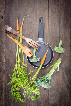 group of vegetable on wooden background 
