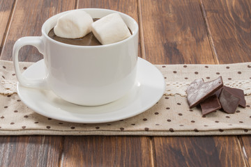 Mug filled with homemade hot chocolate and marshmallow