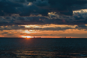 Naklejka na ściany i meble Sunset on the Baltic sea