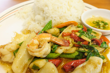 Spicy seafood with basil serve with jasmin rice.