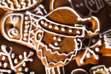 Christmas homemade gingerbread cookies on wooden table