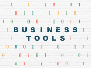Finance concept: Business Tools on wall background