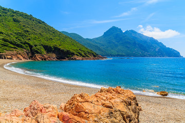 Beautiful secluded beach with azure sea water near Girolata bay, Corsica island, France