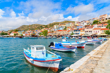 Traditional colourful Greek fishing boats in Pythagorion port, Samos island, Greece