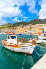 Fototapeta na wymiar Traditional Greek fishing boat in Samos port, Samos island, Greece