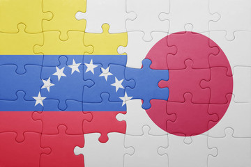 puzzle with the national flag of venezuela and japan