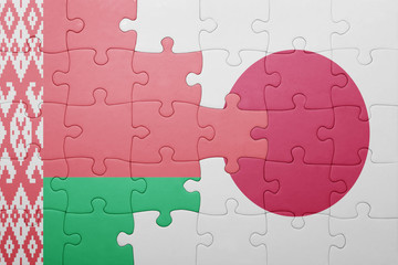 puzzle with the national flag of belarus and japan