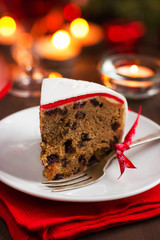 Traditional fruitcake on  Christmas table