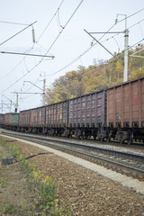 Fototapeta na wymiar Freight transport cars on the railroad in the movement