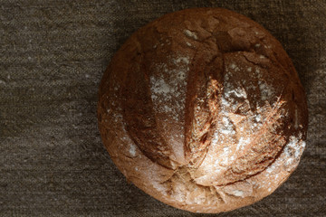 Still rye bread on sacking