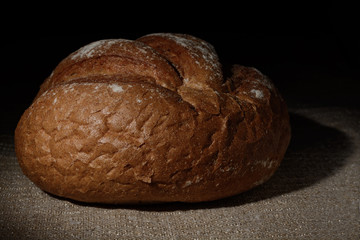Still rye bread on sacking