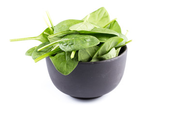 Green spinach on a white background