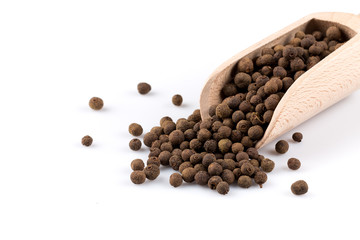 Wooden shovel with black peppercorn