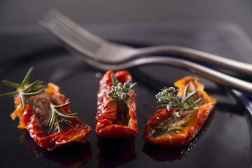 Dried tomatoes with rosemary