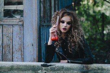 Vintage witch with elixir in hand