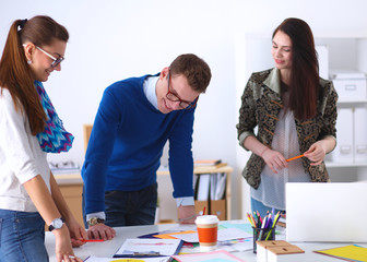 Young business people working at office on new project