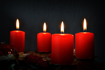 Four burning candles on advent wreath