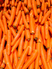 The fresh orange carot in the market close up