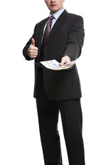 Some unrecognizable Businessman in suit showing a Spread of Pounds Sterling