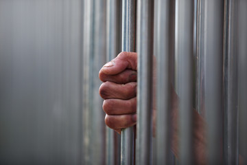 hand in jail