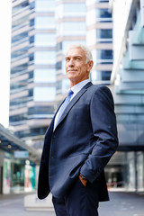 Portrait of confident businessman outdoors