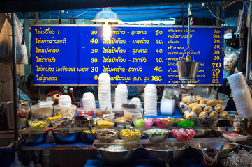 Fototapeta premium Dessert stall at a night market near Khao San Road, Bangkok.