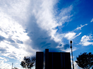 A mansion and clouds
