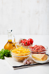 Italian food ingredients: pasta, tomatoes, minced