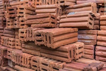 Brick stack on the ground for building.