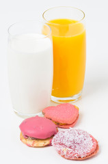 Breakfast with juice, milk and cookies