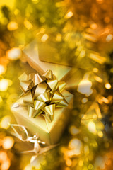 Golden gift boxes on abstract background