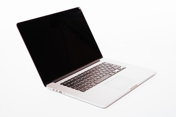 Laptop with blank screen isolated on white background, white aluminium body