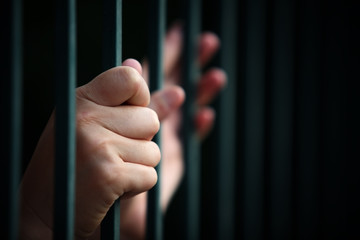 hand in jail.