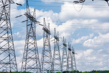 Pylon and transmission power line in summer day