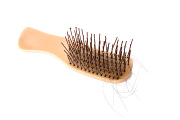 comb brush with lost hair 