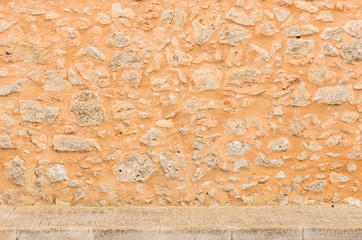 Rustikale alte Steinmauer Hintergrund Textur mit Gehweg