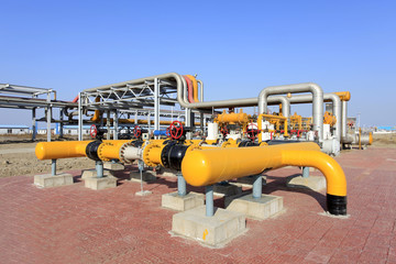 Oil field scene, oil pipelines and facilities