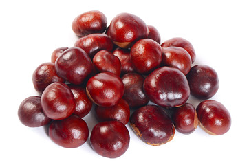 Mature chestnuts isolated on white background