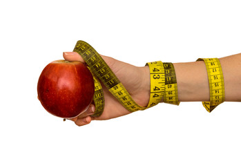 Woman's hand with red apple and measuring tape isolated on white