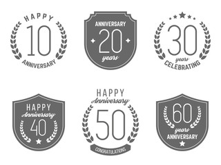 Vector set of anniversary signs, symbols. 10, 20, 30, 40, 50, 60 years jubilee design elements collection.
