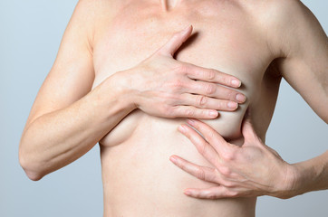 middle-aged Woman Checking Lumps on her Breast