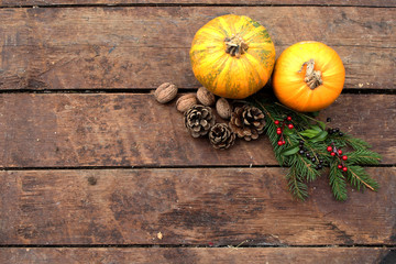 Pumpkin on wooden background - Halloween, Christmas and Thanksgiving concept - decoration and copy space