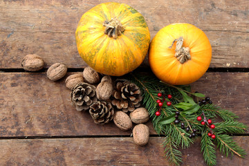 Pumpkin on wooden background - Halloween, Christmas and Thanksgiving concept - decoration and copy space