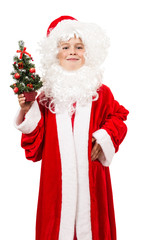 Boy dressed as Santa with a decorative Christmas tree in his han