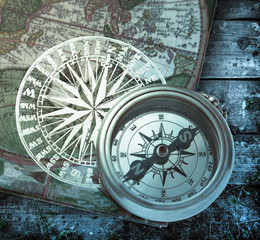 Book with retro compass on it