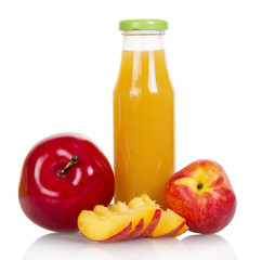 Bottle of baby food with apple and peach juice isolated on white